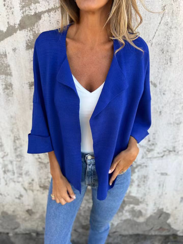 Elegancki damski płaszcz casualowy z klapami Elegancki damski płaszcz casualowy z klapami